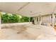 Large carport area offers ample parking with access to the backyard and house at 204 S Elm St, Cherryville, NC 28021