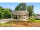 Back of house featuring a white carport attached to the home at 204 S Elm St, Cherryville, NC 28021
