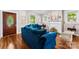 Comfortable living room with hardwood floors, a fireplace, and natural light from the windows at 204 S Elm St, Cherryville, NC 28021
