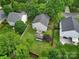 Aerial view of the property showcasing the expansive backyard with a fire pit and shed at 2117 Seabrook Ln, Fort Mill, SC 29715