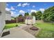 Large backyard with firepit and basketball hoop creating an outdoor entertaining space at 2117 Seabrook Ln, Fort Mill, SC 29715