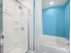 Bathroom featuring a shower stall with glass door and a tub with shower curtain at 2117 Seabrook Ln, Fort Mill, SC 29715