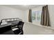 Cozy bedroom with a metal frame bed, brown curtains, and a desk area for studying at 2117 Seabrook Ln, Fort Mill, SC 29715