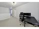 Spacious upstairs landing area featuring desk and chair for home office at 2117 Seabrook Ln, Fort Mill, SC 29715