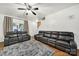 Comfortable living room with wood flooring, plush seating, and a ceiling fan at 2117 Seabrook Ln, Fort Mill, SC 29715