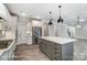 Updated kitchen featuring a gray island, white cabinets, stainless appliances, and modern design at 2232 Tabor Rd # 570, Sherrills Ford, NC 28673