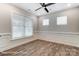 Bright and airy home office with hardwood flooring, ceiling fan, and stylish white trim at 2232 Tabor Rd # 570, Sherrills Ford, NC 28673