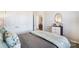 Comfortable bedroom with double doors, dresser, decor and soothing color palette at 2636 Tillman St, Monroe, NC 28112