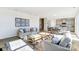 Open-concept living room flows into dining and kitchen with lots of seating at 2636 Tillman St, Monroe, NC 28112