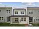 Backyard view of townhome, showcasing siding and small yard at 3042 Finchborough Ct # 235, Charlotte, NC 28269