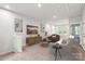 Bright living room with neutral walls, modern furniture, and ample natural light at 3042 Finchborough Ct # 235, Charlotte, NC 28269