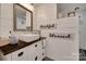 Farmhouse bathroom featuring a vessel sink, shiplap walls, and an enclosed shower at 3091 Old Meeting House Rd, Sharon, SC 29742