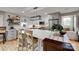 Modern kitchen with a white subway tile backsplash, updated appliances, and a large center island with barstool seating at 3091 Old Meeting House Rd, Sharon, SC 29742