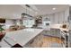 Beautiful kitchen with large island, modern light fixtures, and hardwood floors at 3091 Old Meeting House Rd, Sharon, SC 29742