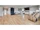 Bright living room with hardwood floors, a cozy sofa, decor, and easy access to the rest of the home at 3091 Old Meeting House Rd, Sharon, SC 29742