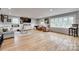 Spacious living area with hardwood floors, comfortable seating, and bright natural light at 3091 Old Meeting House Rd, Sharon, SC 29742