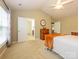 Spacious bedroom with neutral tones, complemented by a double door closet and ensuite bathroom at 3224 Dunbar Ln, Fort Mill, SC 29707