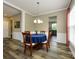 Elegant dining area adjacent to living space, hardwood floors and an inviting atmosphere at 3224 Dunbar Ln, Fort Mill, SC 29707