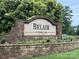 Belair at Carolina Lakes stone entrance sign surrounded by vibrant landscaping and flowers at 3224 Dunbar Ln, Fort Mill, SC 29707