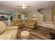 Open-concept living room with views into the kitchen and entryway, showcasing modern design and natural light at 3224 Dunbar Ln, Fort Mill, SC 29707