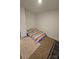 A simple, cozy bedroom featuring carpeted floors and a brightly colored blanket perfect for a or guest at 324 Gaines Rd # 8, Clover, SC 29710
