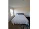 Well-lit bedroom featuring neutral walls, plush carpet, and a window that provides plenty of natural light at 324 Gaines Rd # 8, Clover, SC 29710