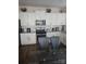 Well-lit kitchen featuring white cabinets, granite countertops, stainless steel appliances, and tiled backsplash at 324 Gaines Rd # 8, Clover, SC 29710