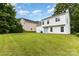 Spacious backyard with lush green lawn and mature trees at 3312 James Rd, Charlotte, NC 28215