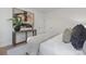 Bedroom featuring a large abstract painting, hardwood floors, and a comfortable bed with decorative pillows at 3314 & 3316 Cedarhurst Dr, Charlotte, NC 28269