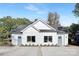 Charming duplex with modern farmhouse appeal, boasting a symmetrical facade and inviting curb appeal at 3314 & 3316 Cedarhurst Dr, Charlotte, NC 28269