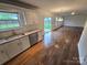Bright eat-in kitchen with stainless appliances and granite counters with backyard view at 3912 Laurel View Cir, Indian Trail, NC 28079