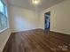 Bright living room area with view of stainless steel appliances at 3912 Laurel View Cir, Indian Trail, NC 28079