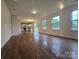 Spacious living room featuring lots of natural light and kitchen access at 3912 Laurel View Cir, Indian Trail, NC 28079
