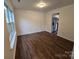 Bright living room area with view of stainless steel appliances at 3912 Laurel View Cir, Indian Trail, NC 28079