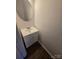 Powder room featuring a single sink vanity with a round mirror at 3912 Laurel View Cir, Indian Trail, NC 28079