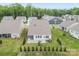 Expansive aerial view of the home and large backyard with lush lawn and nearby neighborhood at 4015 Havenport Cir, Fort Mill, SC 29708