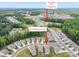 Aerial view of the community with clubhouse, pool, playground and nearby homes at 4015 Havenport Cir, Fort Mill, SC 29708