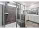 Modern bathroom featuring gray-tiled shower with bench and double sink vanity with gray-tiled flooring at 4015 Havenport Cir, Fort Mill, SC 29708