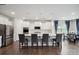 Contemporary kitchen featuring a large island with seating, stainless steel appliances, and white cabinetry at 4015 Havenport Cir, Fort Mill, SC 29708