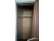 A view of a simple closet space with a rod for hanging clothes at 407 Lincoln St, Wadesboro, NC 28170