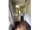 Kitchen with stainless steel sink and a view into another room at 407 Lincoln St, Wadesboro, NC 28170