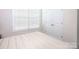 Bright bedroom with window and ample closet space, features neutral walls and carpet at 4245 Millstream Rd, Denver, NC 28037