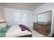 Bedroom with a window, large dresser, and comfortable bed at 4245 Millstream Rd, Denver, NC 28037
