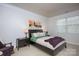 Bedroom featuring a seating area with a rocking chair and a large window at 4245 Millstream Rd, Denver, NC 28037