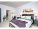 Bright bedroom featuring neutral walls, and a stylish seating area at 4245 Millstream Rd, Denver, NC 28037
