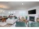 Spacious living area featuring a fireplace, modern decor, and a cozy atmosphere at 4245 Millstream Rd, Denver, NC 28037