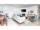 Bright and airy living space featuring a fireplace, natural light, and hardwood floors at 4245 Millstream Rd, Denver, NC 28037