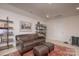 Living room featuring a couch, bookshelf, and stylish décor at 4245 Millstream Rd, Denver, NC 28037