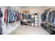 A spacious walk-in closet with ample shelving and hanging storage at 4245 Millstream Rd, Denver, NC 28037