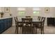 Dining room featuring hardwood floors, neutral walls, and table, perfect for Gathering meals at 443 Brandon St, Davidson, NC 28036